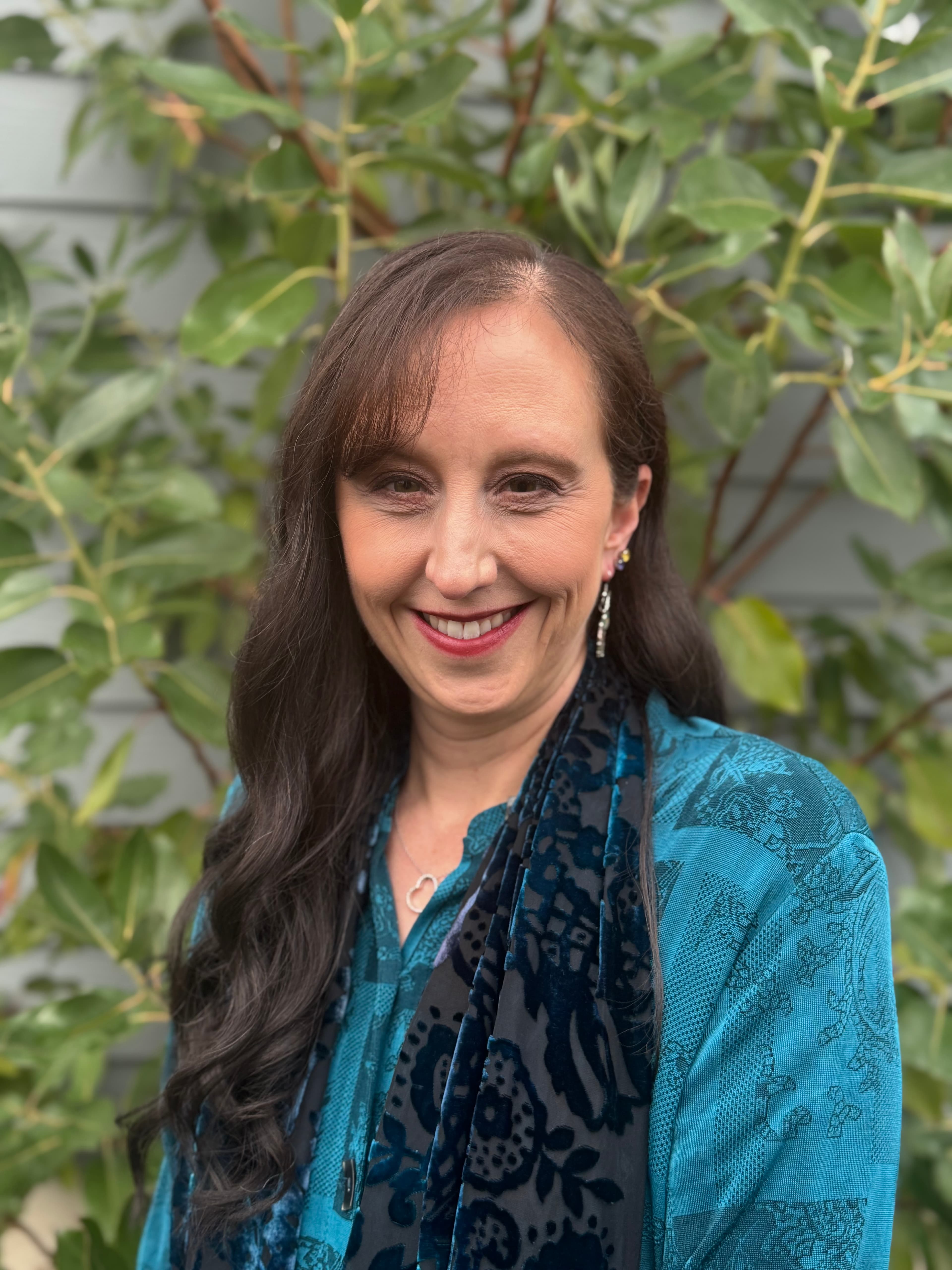Portrait of Alli Santa, counselor at Live, Laugh & Love Counseling